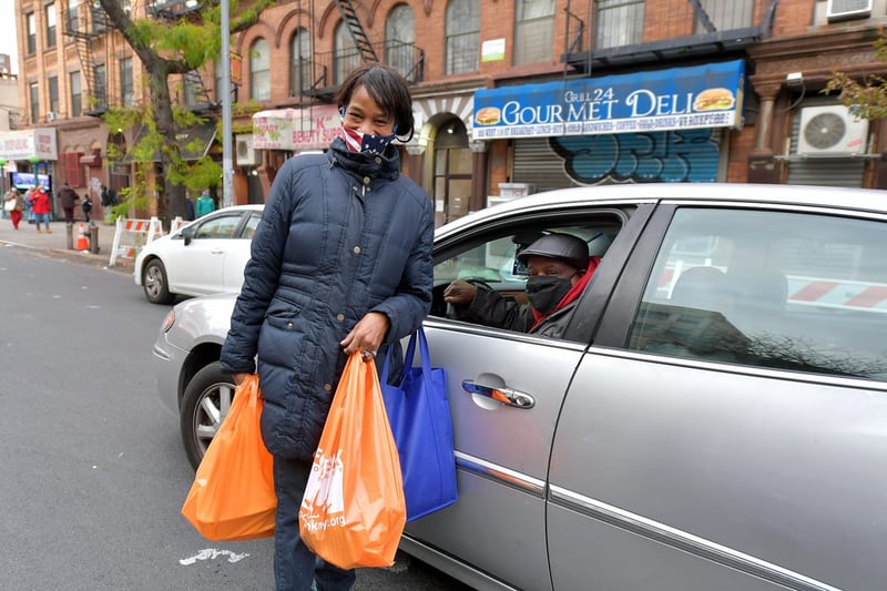 Client after receiving food from Food Bank For New York City