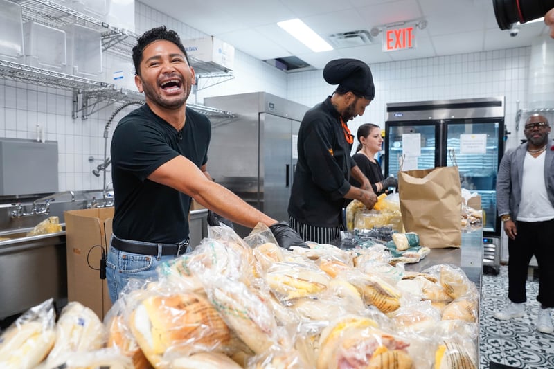 Isaac Boots packs food at Food Bank For New York City Community Kitchen.